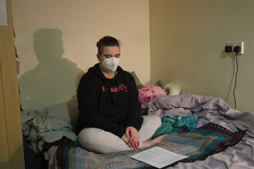 Aspen sat looking down at their script.