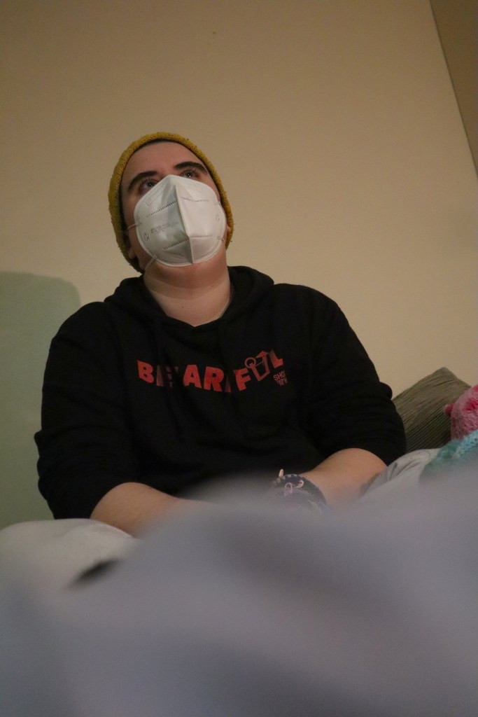 Aspen stares upwards.