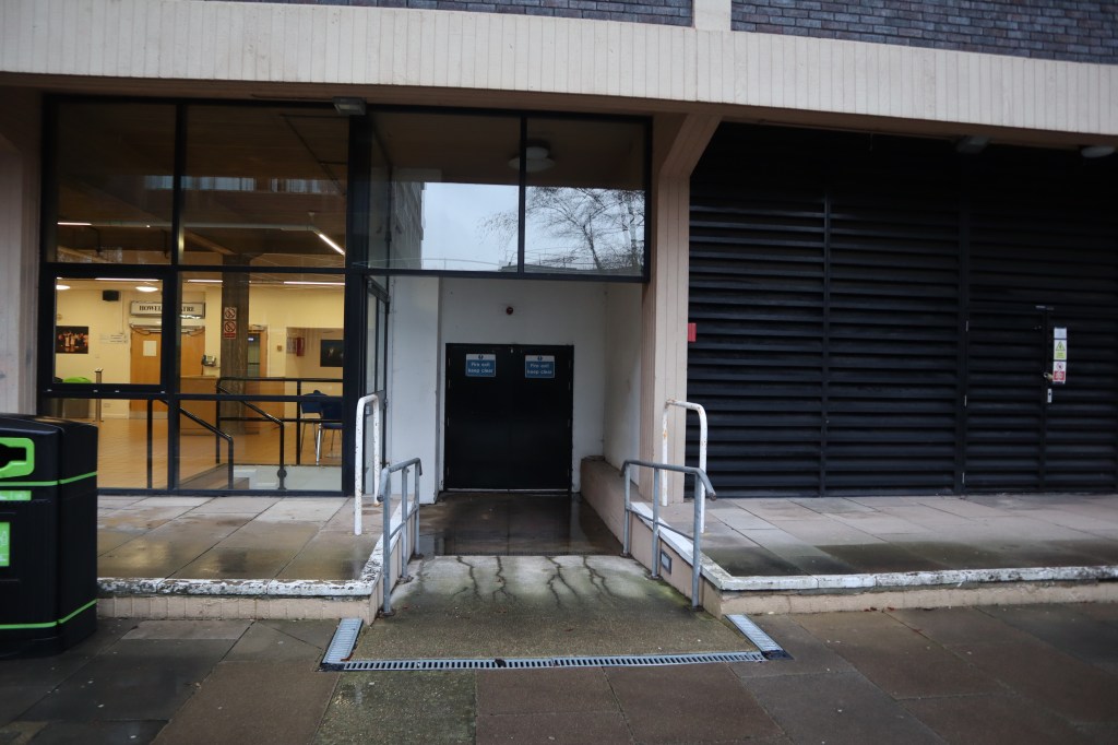 An image of the ramp down to the fire exit used for step-free access to the front row.